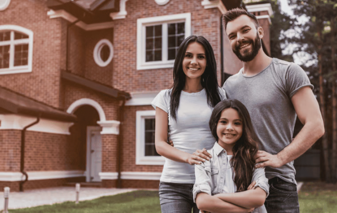 Happy Family outside home 